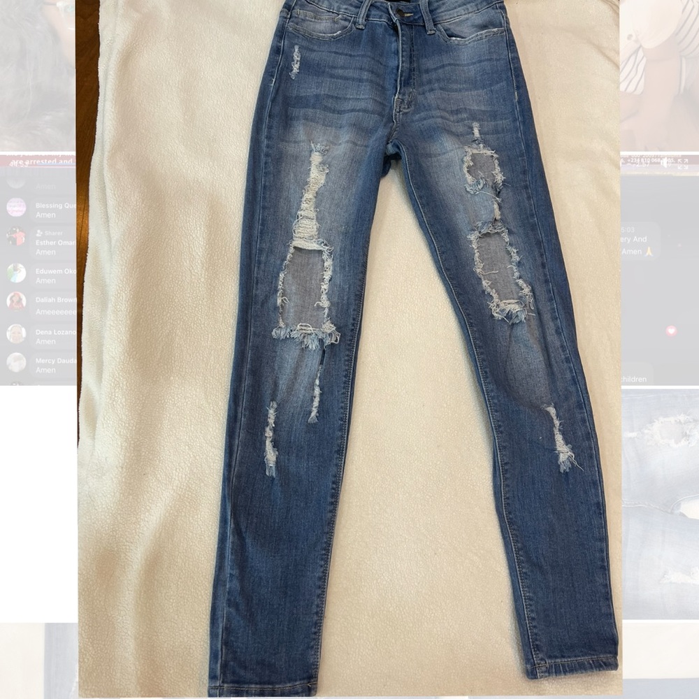 Distress high rise skinny jeans